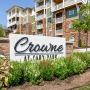 Cary Crowne at Cary Park Furnished Apartments and Brick Sign